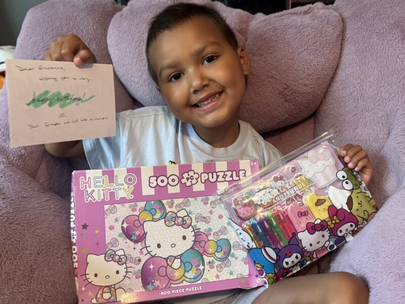 Child receiving support from Liv Like a Unicorn Foundation during childhood cancer treatment.